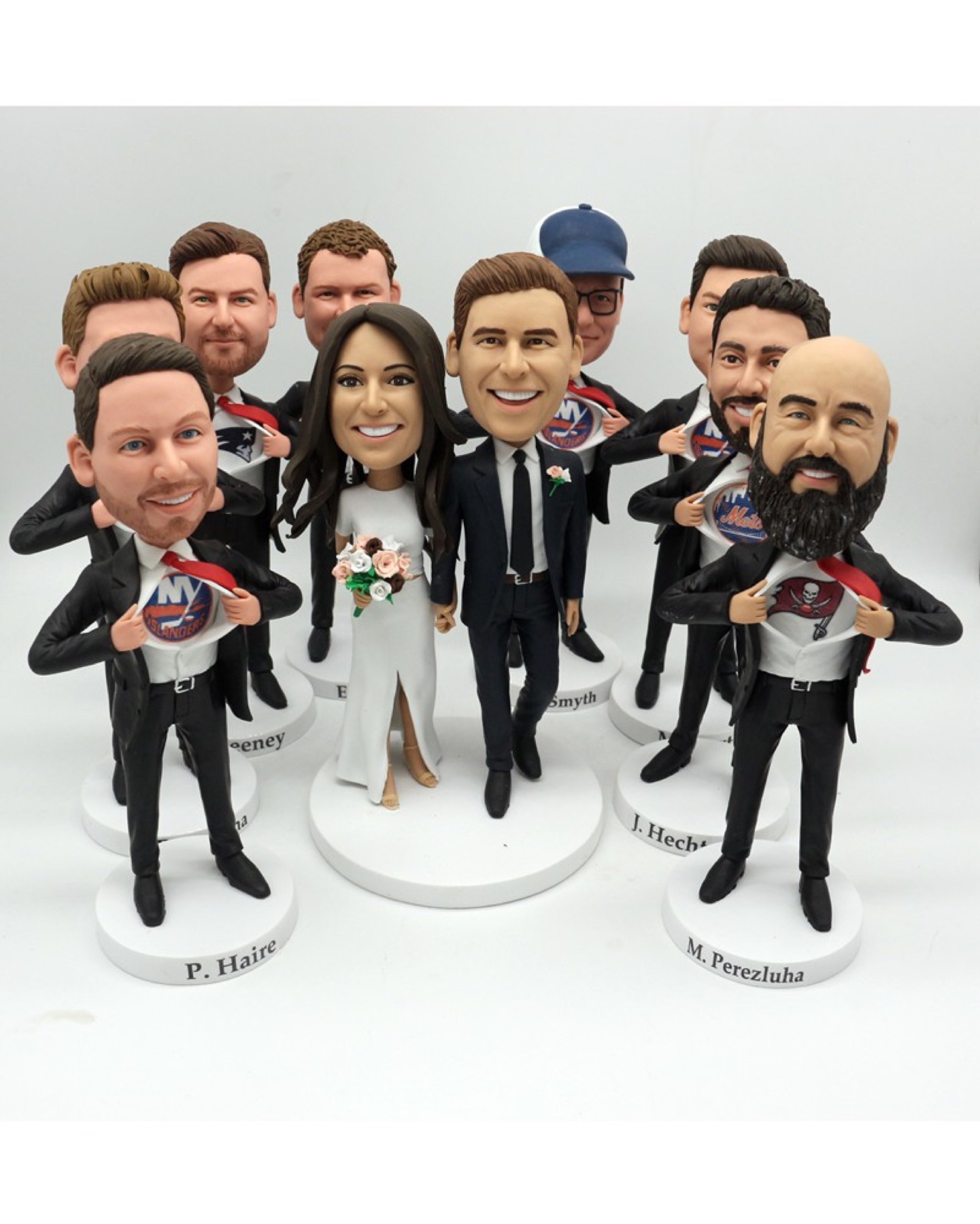 Collection of handmade wedding party figurines