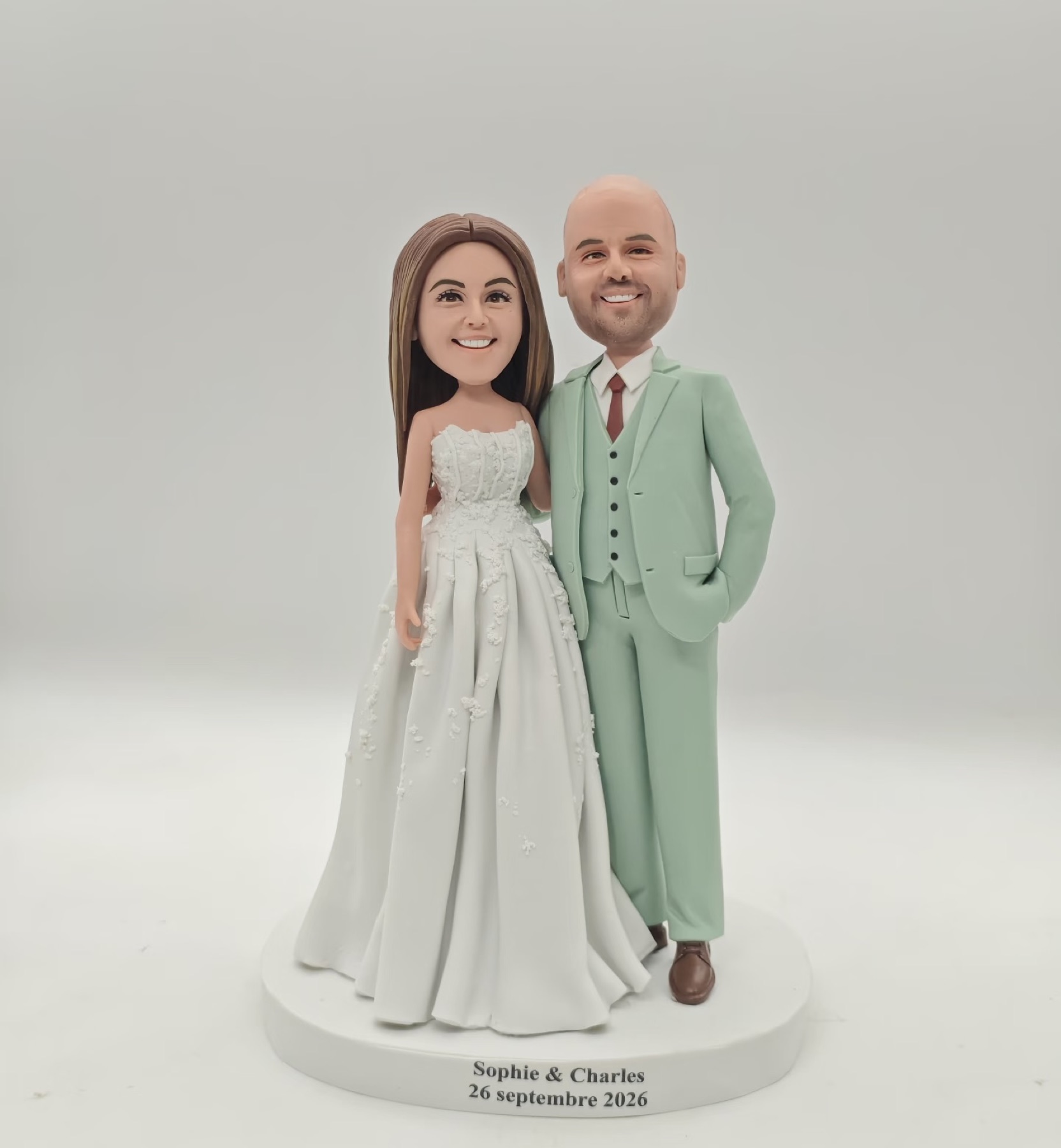 Custom clay portrait of a couple in wedding clothes